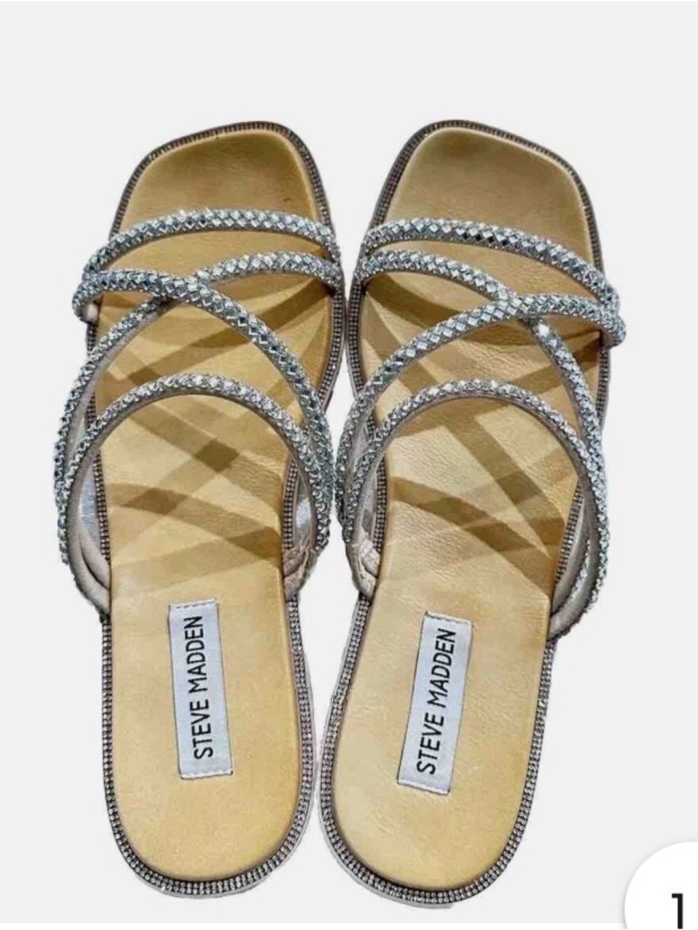 Steve Madden featuring rhinestone-embellished straps
Sandal Size7